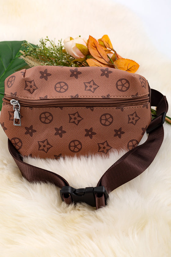 Lt. Brown sling bag that can be use as a crossbody. BBG40076 M