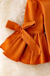 RPG40286 LOI: burnt orange bubble sleeve baby onesie w/snaps.