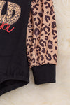 Wild about you" Black cotton made baby onesie w/ leopard sleeves. RPG05154012 NAYDINE