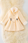 TPG40409 Sol: Ivory lined jacket with cozy fur trim.