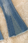 Bootcut denim pants with holographic rhinestones. PNG40777 Nay