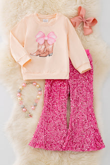  OFG41420 JEAN: Cowgirl sweatshirt and fuchsia sequins pants.