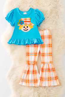  OFG41717 WEN: Scarecrow applique on turquoise & plaid pants.