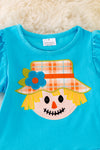 OFG41717 WEN: Scarecrow applique on turquoise & plaid pants.