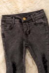 PNG40451 JEAN: Black distressed denim pants.