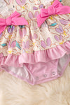 Lilac, blue & fuchsia twirl onesie with side bows. RPG50210 SOL