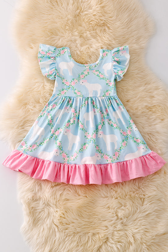 Sweet Lamb printed on blue dress with pink ruffle trim. DRG50360 NAY