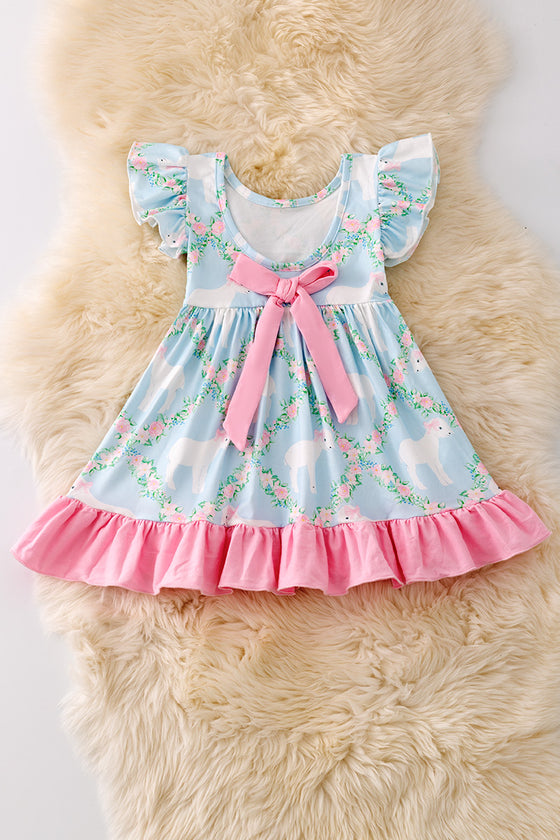 Sweet Lamb printed on blue dress with pink ruffle trim. DRG50360 NAY