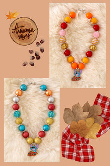  Multi-color bubble necklace with pendant.