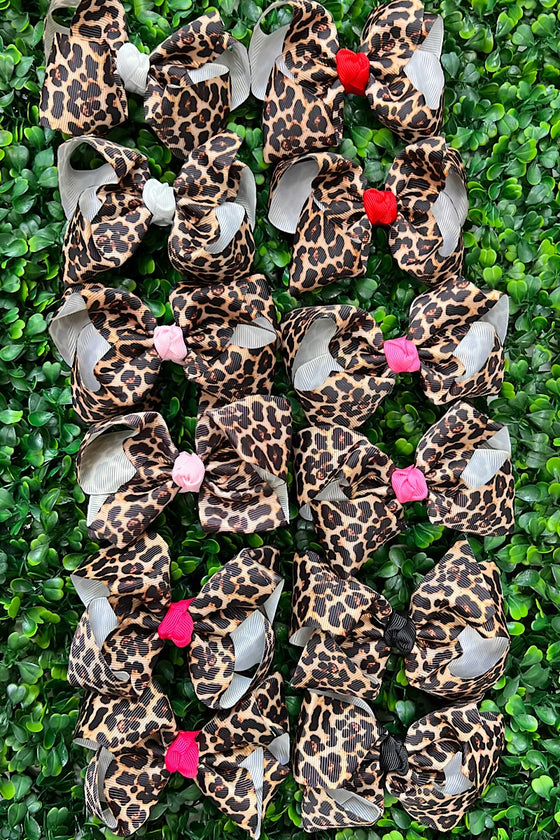 12piece jaguar printed hair bows. 4" with multi color centered. BW-DSG-Ja1