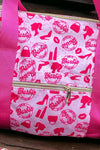 Multi-Barbie printed duffle bag with strap. TT2028LR