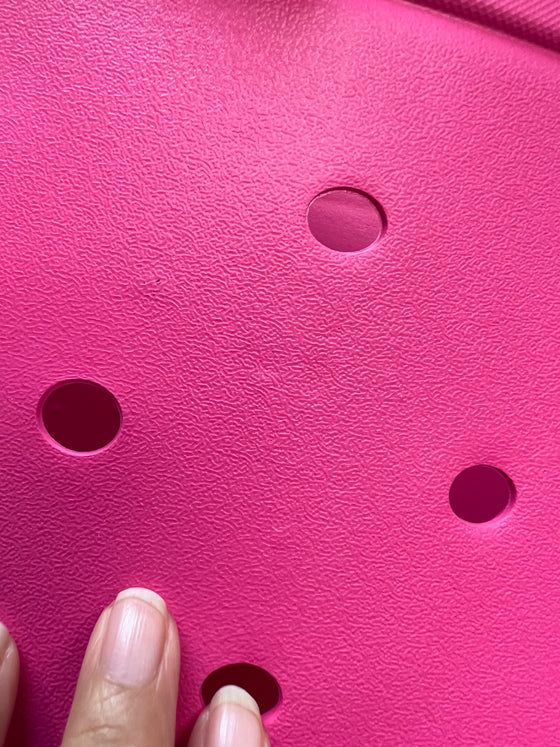 Hot pink beach bag with Small defects.