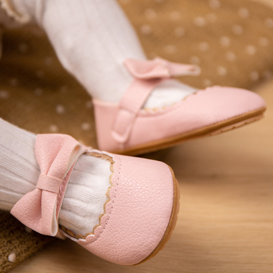 White pleather baby shoes. HM1628