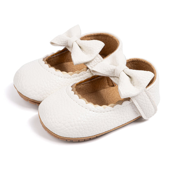 White pleather baby shoes. HM1628