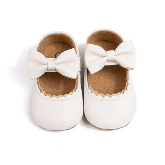 White pleather baby shoes. HM1628