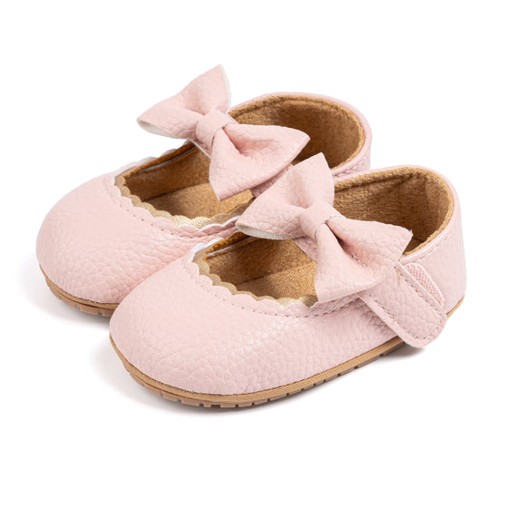 White pleather baby shoes. HM1628