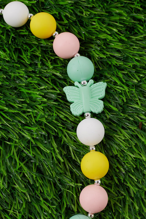 PASTEL COLORS BUBBLE GUM NECKLACE W/ SIDE BUTTERFLY PENDANT. (3PCS/$15.00) ACG25113012