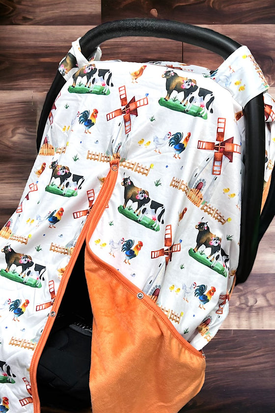 COW PRINTED CARSEAT COVER W/ORANGE SOFT FABRIC. ZYTB25133006