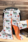 COW PRINTED CARSEAT COVER W/ORANGE SOFT FABRIC. ZYTB25133006