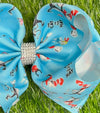 CHARACTER PRINTED ON TURQUOISE DOUBLE LAYER HAIR BOWS W/ RHINESTONE. BW-DSG-793