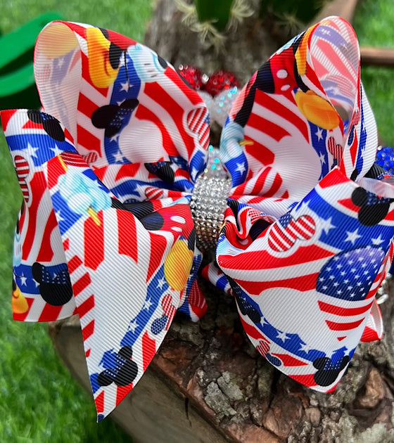 CHARACTER PRINTED/PATRIOTIC HAIR BOW. 7.5" WIDE 4PCS/$10.00 BW-DSG-636