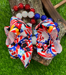  CHARACTER PRINTED/PATRIOTIC HAIR BOW. 7.5" WIDE 4PCS/$10.00 BW-DSG-636